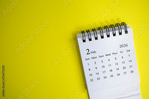 Desktop calendar for February 2026 on a yellow background with a place to copy.