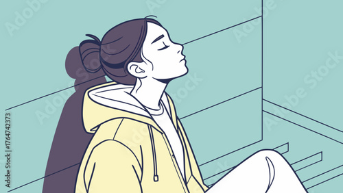 A young woman with her eyes closed and head tilted back, wearing a yellow hoodie, appears to be meditating or relaxing.