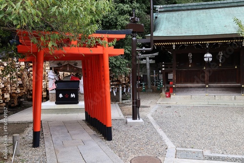 A Japanese shrine : the scene of a subordinate one in the precincts of Kitano-tenmangu Shrine in Kyoto City