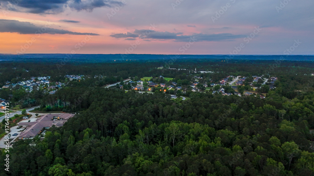 Fototapeta premium Aerial sunset landscape from Evans Town Center Park summer sunset in CSRA Augusta Georgia