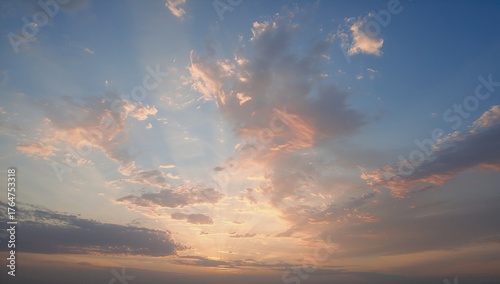Twilight sky glowing with the last light of the sun among stunning clouds