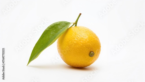 A single fresh lemon with a...