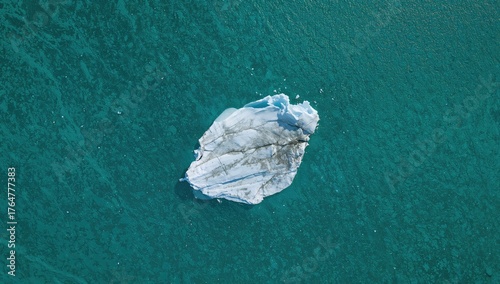 Lone iceberg showcasing lay...