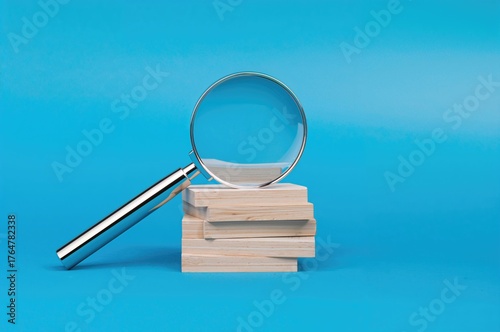 Wooden cubes and magnifier ...
