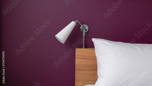 Sleek bedside wall sconce f...