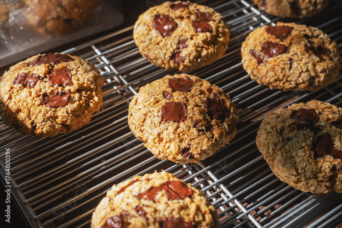 dark chocolate chunk oatmeal cookies on cooling rack.