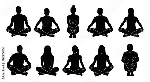 Silhouettes of people meditating in lotus position a mindful practice