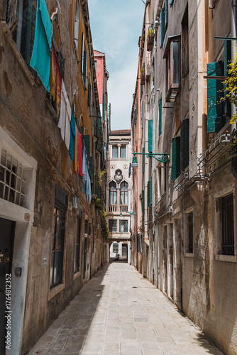 Stone apartment building alleyway in downtown historic Venice, Italy