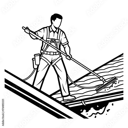 Worker cleaning roof with longhandled brush and hose