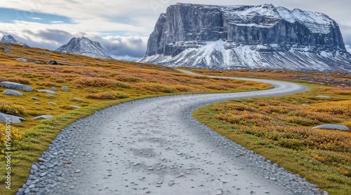 Winding Road to Mountain Top: A serene journey along a winding gravel road amidst autumnal landscapes. The majestic mountain and inviting path offer a sense of adventure and tranquility.