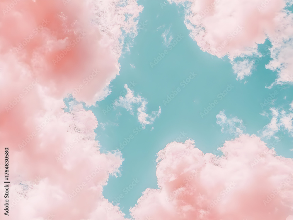 Fototapeta premium Dreamy Pink Clouds Against a Turquoise Sky.