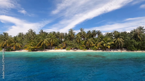 Luxury resort photo of Maldives tropical paradise islands
in Indian Ocean with palm trees. Beautiful photography, 
coral reef, azure ocean, sky with clouds on horizon.