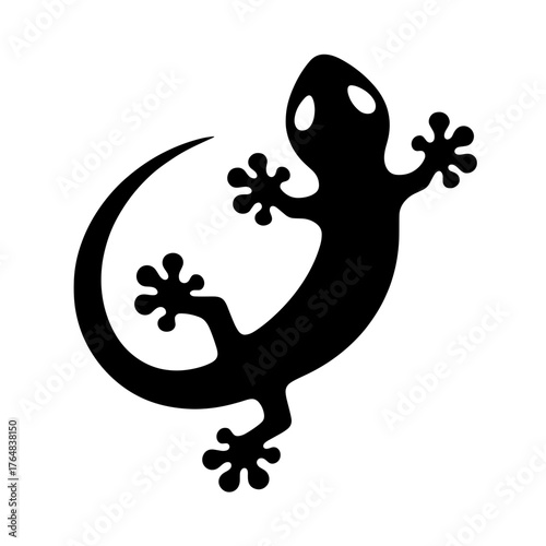 A silhouette of a gecko