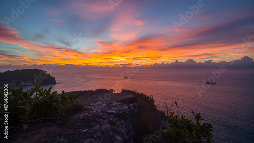 A picturesque sunset on the Andaman Sea at Windmill View Point, near Laem Promthep Cape, Phuket, Thailand