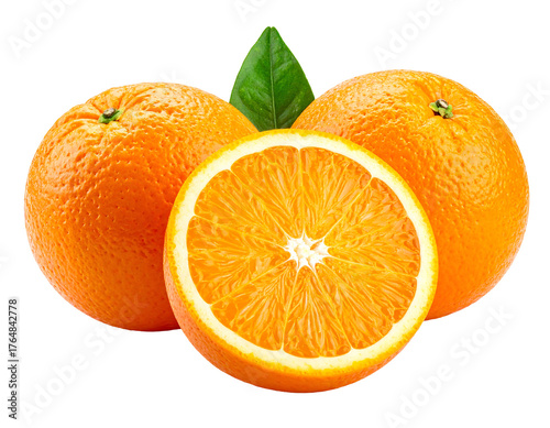 Three oranges, one cut in half, with a single green leaf on a black background