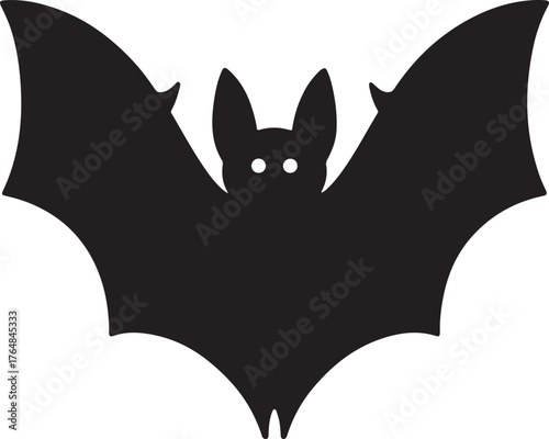 Silhouette of a black bat with glowing eyes and spread wings