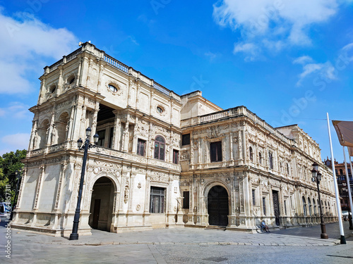 Casa consistorial de Sevilla, the city council of Seville, Andalusia, Spain, Europe. City Hall with plateresque reliefs, grotesque motifs, heraldry symbols, and allegories. July 29, 2025. 