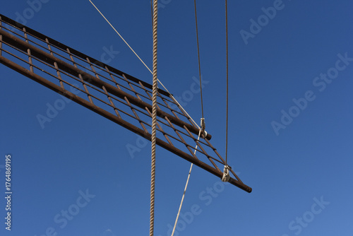 Detail of mill in Marsala. Trapani wind mill sea salt production. The salt flats with a windmill. Windmill at the Riserva Naturale Saline di Trapani, an Italian nature reserve, Sicily, Italy. 