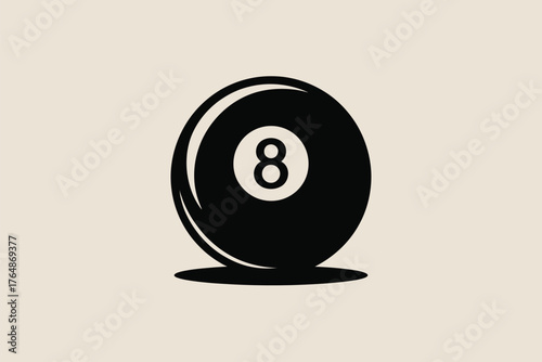 Classic black eight ball poised for a game of pool