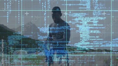 Man inspecting training sticks on coastal dune, then swinging sticks for martial arts practice