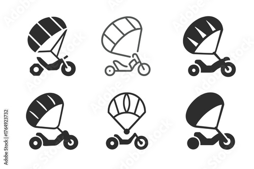 Kite Buggy Logos. Kite buggy. Set Logo of Kite buggy: traction kite towing sand buggy. harmonious logo variations of the same emblematic concept, each with