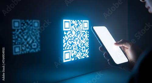 QR code scan using a smartphone, user scanning QR code to get more information and access data. Scanning QR code makes mobile payment safe and reliable.