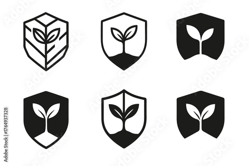 Rainforest Conservation Logos. Rainforest conservation. Set Logo of Rainforest conservation: shield with sprouting tree. harmonious logo variations of the same
