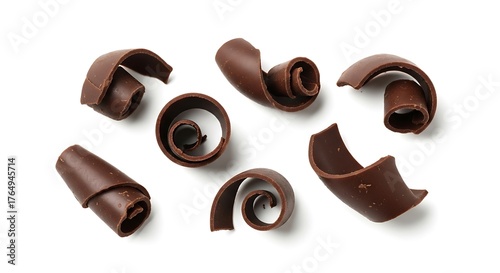 Isolated on white background, a delectable assortment of dark chocolate curls, each one a testament to the artistry and indulgence of confectionery