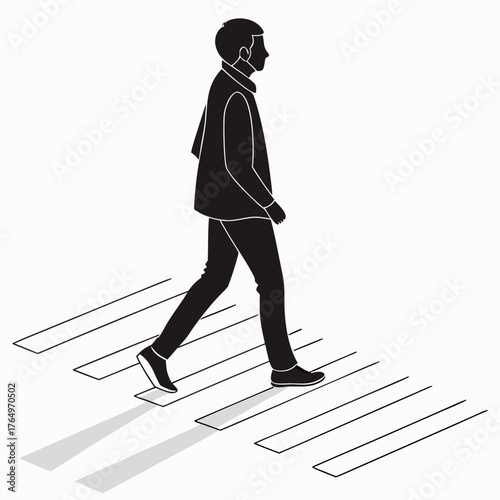 Silhouette of a man walking on a crosswalk
