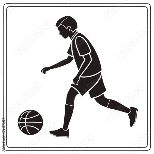 Boy dribbling basketball in black and white