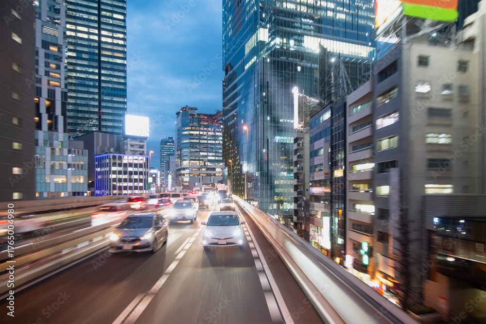 Obraz premium A night traffic jam on the city highway in Tokyo, Japan