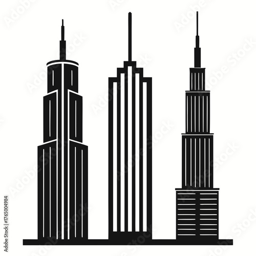 Silhouettes of three tall skyscrapers and construction cranes against a light horizon
