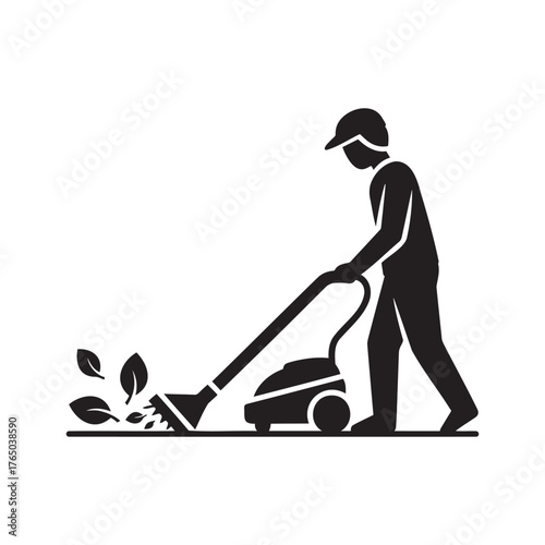 Gardener using leaf blower to clear leaves in a garden  