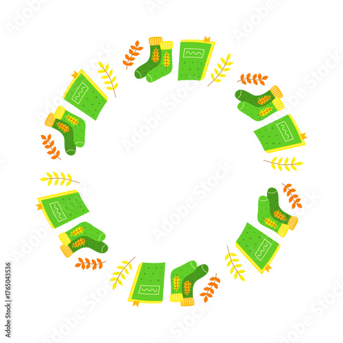 Cute hand drawn flat autumn icons composed in circle shape isolated on white background. Round frame with warm socks, book and leaves.