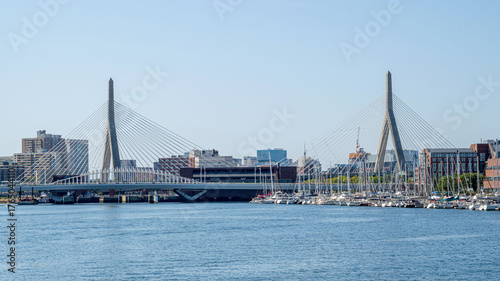 The skyline of downtown Boston with Leonard P. Zakim Bunker Hill Memorial Bridge on the foreground 