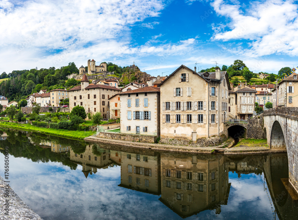 Obraz premium Laroquebrou typical village and la Cère river, Cantal, France, is an important passage, the via Arverna, for pilgrims on their way to Santiago de Compostela via Rocamadour.