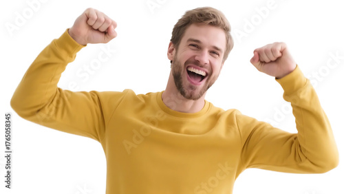 A man in a yellow sweater shows a joyful expression with raised fists, conveying a sense of triumph and excitement.