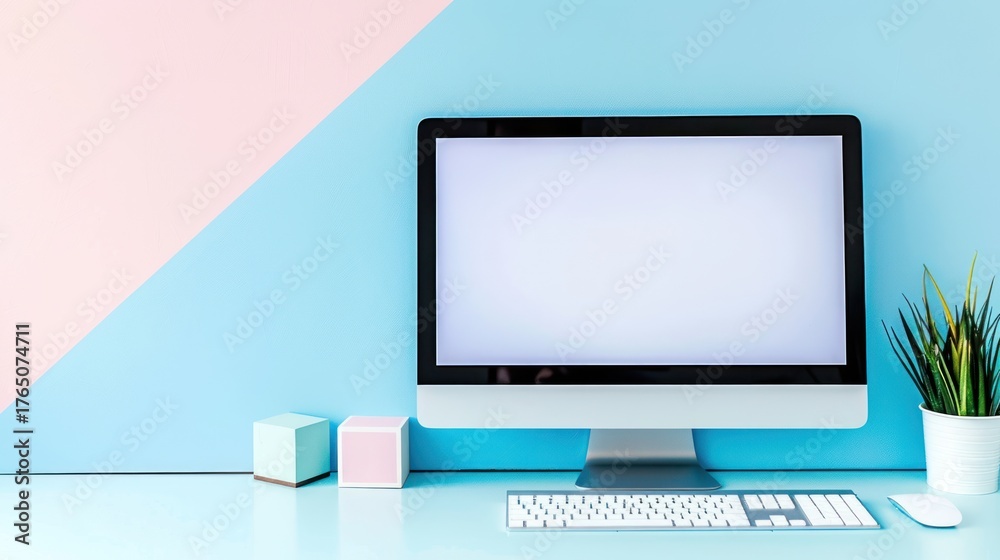 Fototapeta premium Modern Desktop Computer with White Screen in Bright Pastel Workspace