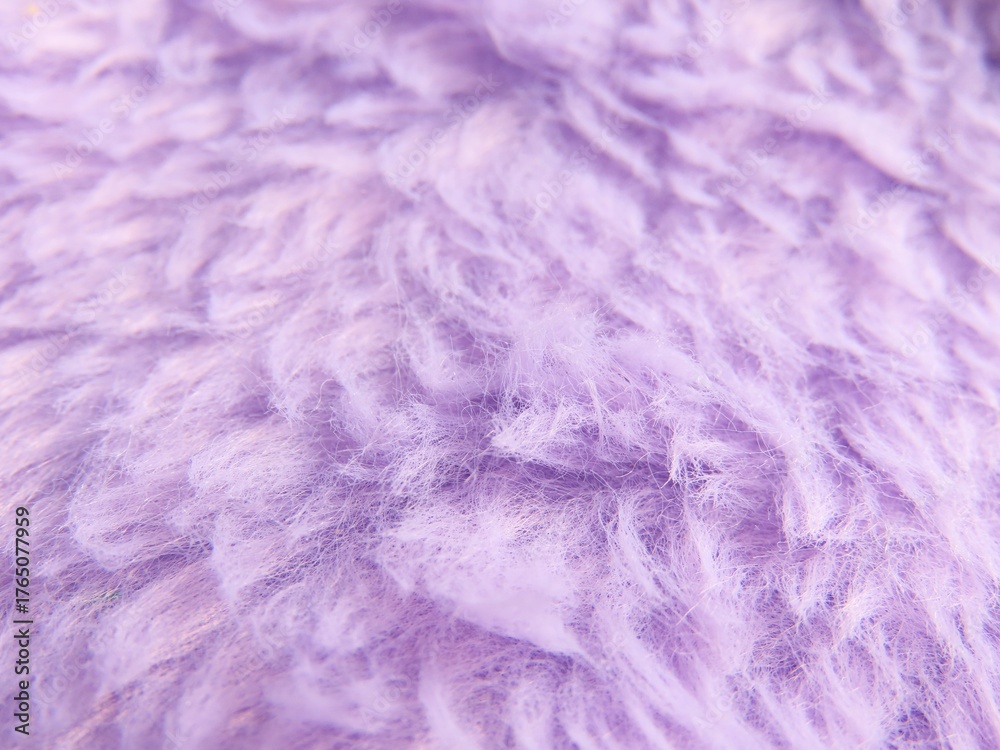 Obraz premium Fluffy lilac texture background. Closeup of fluffy fabric.