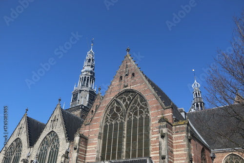 arch window of the oude kerk church in amsterdam