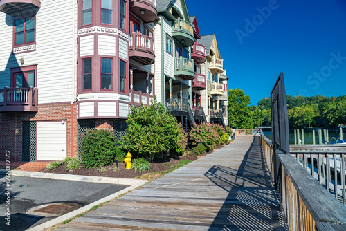 Vibrant riverside architecture in Woodbridge, VA with boats and reflections