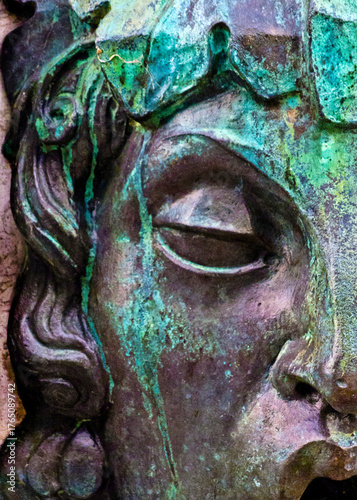 Φωτογραφία Close-up of a weathered statue face with closed eyes