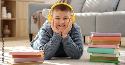 Little boy with headphones ...