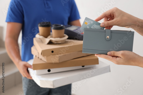 Female hands taking credit ...