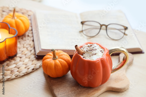 Cup of latte with pumpkin o...
