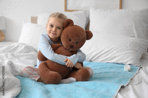 Cute little girl with toy b...