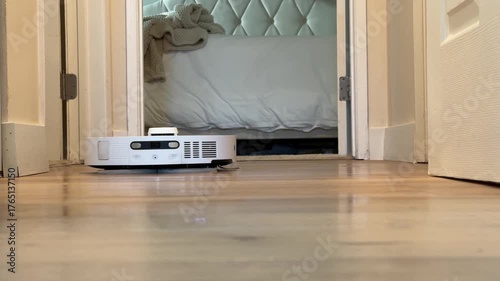 Robotic vacuum cleaning a hardwood floor