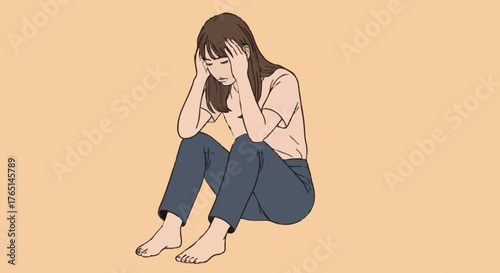 Anxious young woman sitting on the floor, holding her head in despair and feeling stressed.