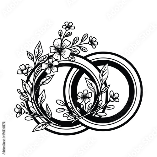Elegant Wedding Rings with Floral Accents in Black and White.