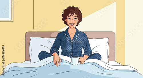 Woman in pajamas sitting on bed with a mug in her hands.
